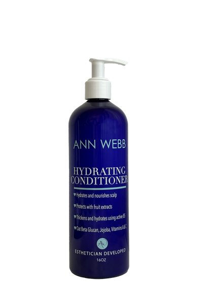 A 16oz pump bottle of Ann Webb Hydrating Conditioner, featuring a deep cobalt blue bottle and a white pump dispenser, set against a plain white background.