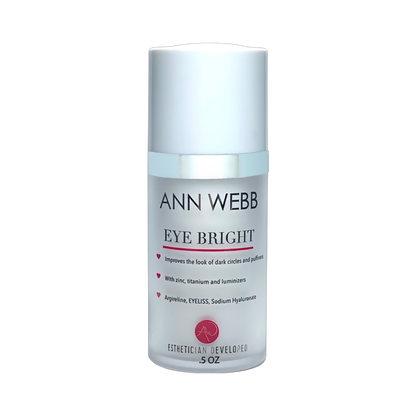 Ann Webb Eye Bright eye cream in a 5 oz frosted bottle with a white cap and silver accents, shown on a plain white background.