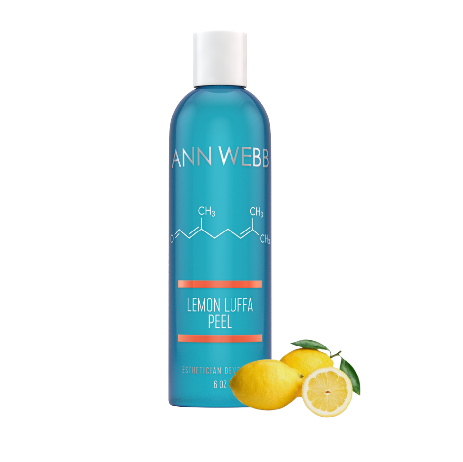 A bottle of Ann Webb Lemon Luffa Peel esthetician gel, featuring a bright blue bottle with a white cap and white text, accompanied by fresh yellow lemons and a lemon slice on a solid white background.