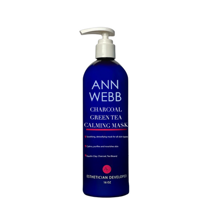 A 16 oz pump bottle of Ann Webb Charcoal Green Tea Calming Mask, featuring a deep cobalt blue bottle and a white pump dispenser, set against a plain white background.