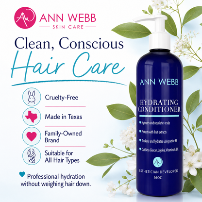 Ann Webb Skin Care Hydrating Conditioner bottle on a white background with decorative green leaves and white flowers. The left side includes marketing text and feature icons for cruelty-free, made in Texas, family-owned, and suitable for all hair types.