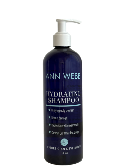 A 16 oz pump bottle of Ann Webb Hydrating Shampoo, featuring a dark navy blue bottle and a white pump dispenser, set against a plain white background.